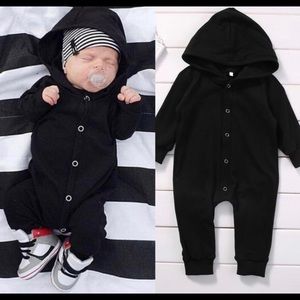 Solid black button down romper